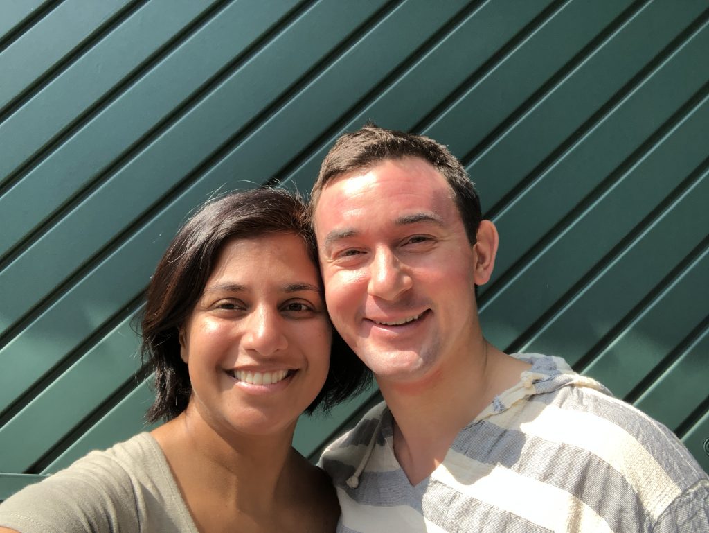 Us in front of garage in Damians neighborhood